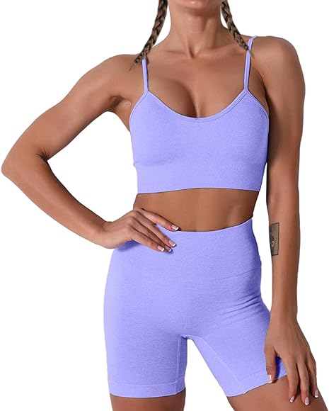 A woman wearing a purple sports bra and shorts